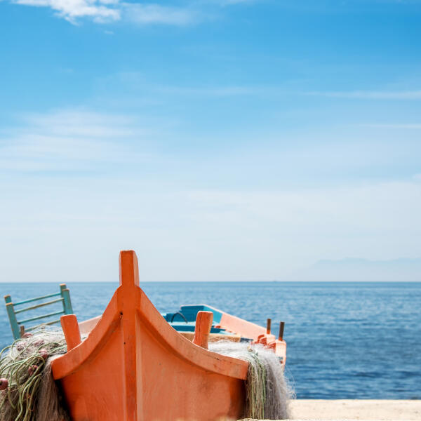 Fishing boat on the beach in Alexandroupolis, Greece - copy space